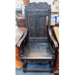 AN OAK WAINSCOT CHAIR