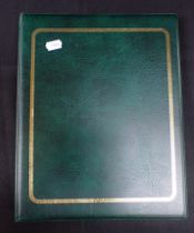 AN ALBUM OF MINT UNMOUNTED STAMPS (GREEN)