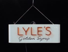 A VINTAGE ILLUMINATED ADVERTISING SIGN; 'LYLE'S GOLDEN SYRUP'