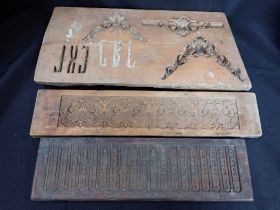 THREE ANTIQUE CARVED WOODEN MOULDS