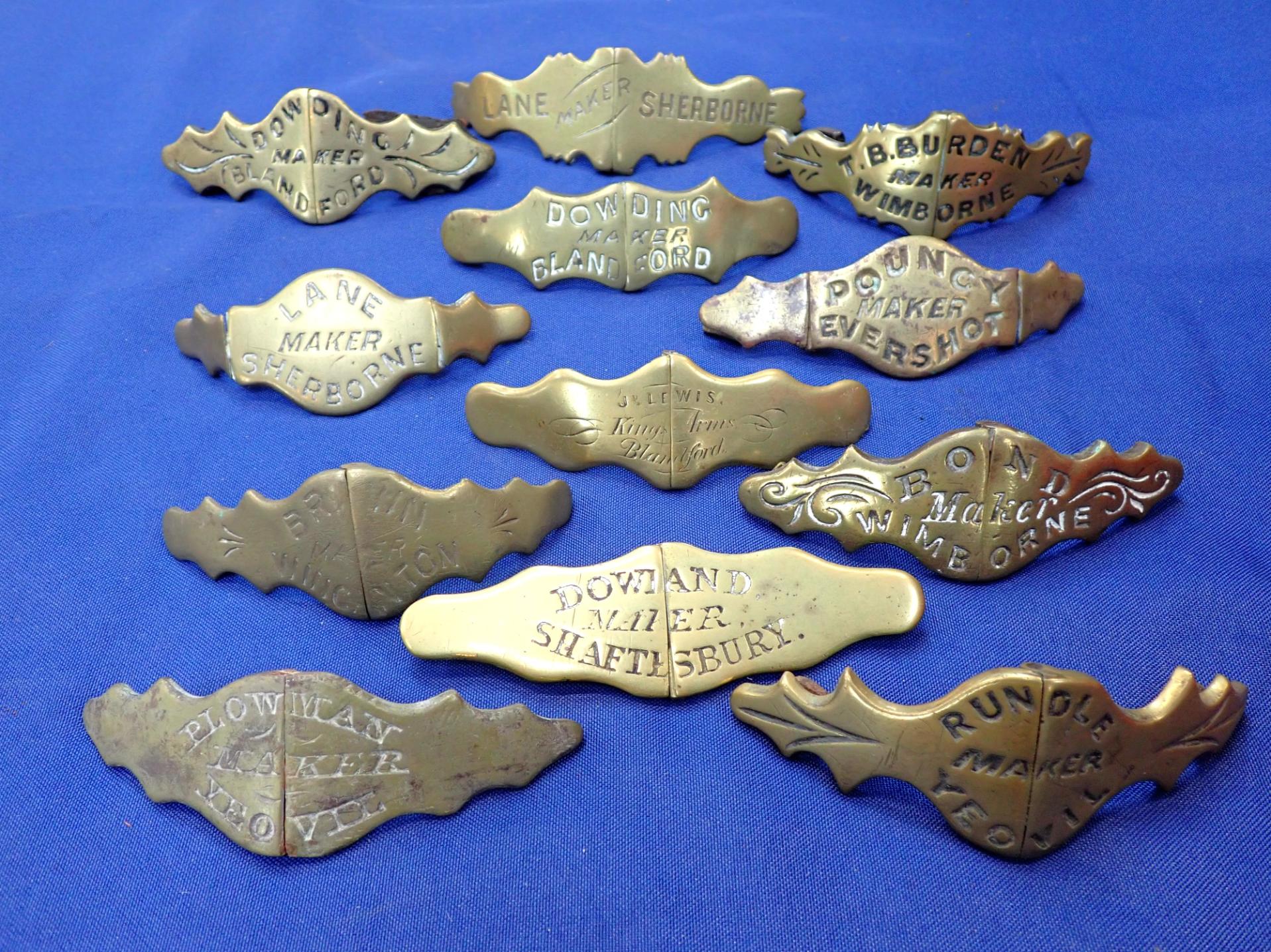 A COLLECTION OF HORSE NOSEBAND PLATES, NAMED