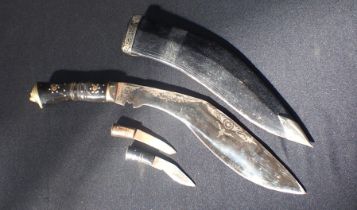 A KUKRI, WITH INLAID GRIP