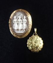 A 14K ROLLED GOLD CIRCULAR LOCKET