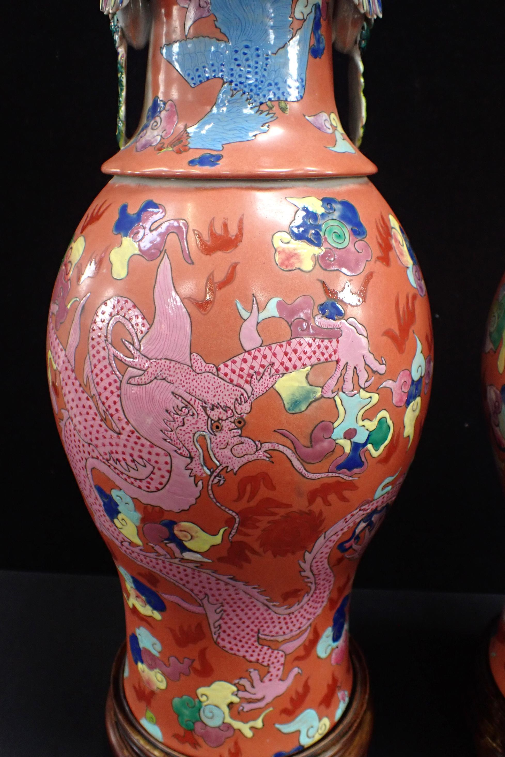 A PAIR OF REPRODUCTION CANTONESE TWO-HANDLED VASES - Image 2 of 3