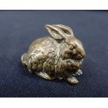 A SMALL BRONZE RABBIT