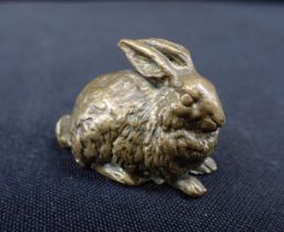 A SMALL BRONZE RABBIT