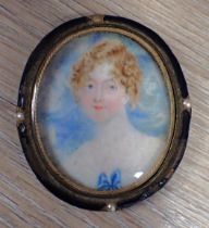 A 19th CENTURY PORTRAIT MINIATURE OF A YOUNG WOMAN