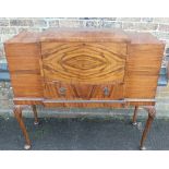 A 1930s WALNUT BUREAU/DRINKS CABINET