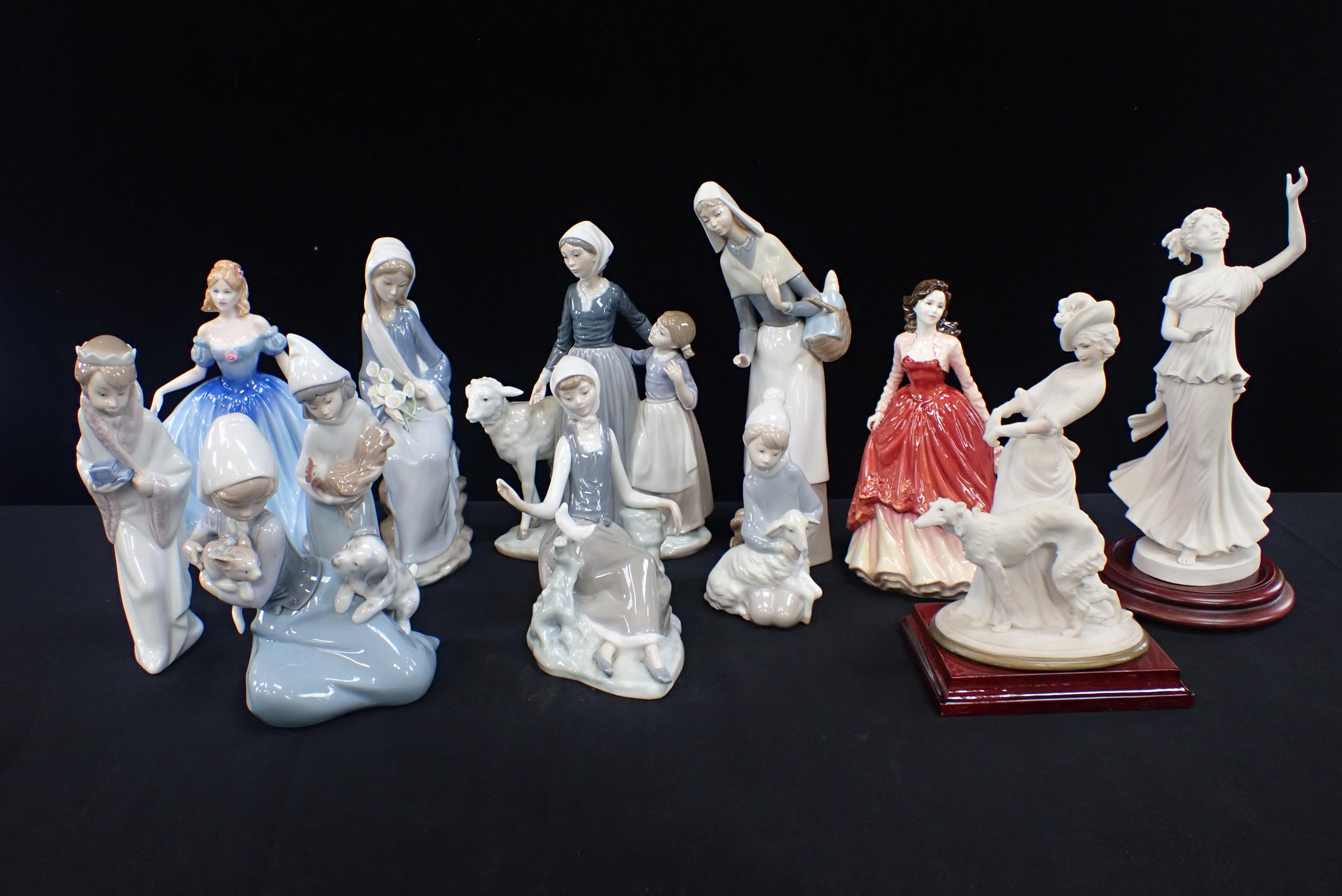 A COLLECTION OF LLADRO AND ROYAL DOULTON FIGURINES