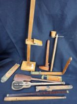 A COLLECTION OF ANTIQUE MEASURING INSTRUMENTS