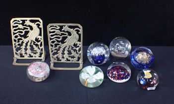 SEVEN GLASS PAPERWEIGHTS AND A PAIR OF BRASS BOOKENDS