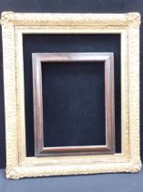 A 19th CENTURY GILT GESSO PICTURE FRAME