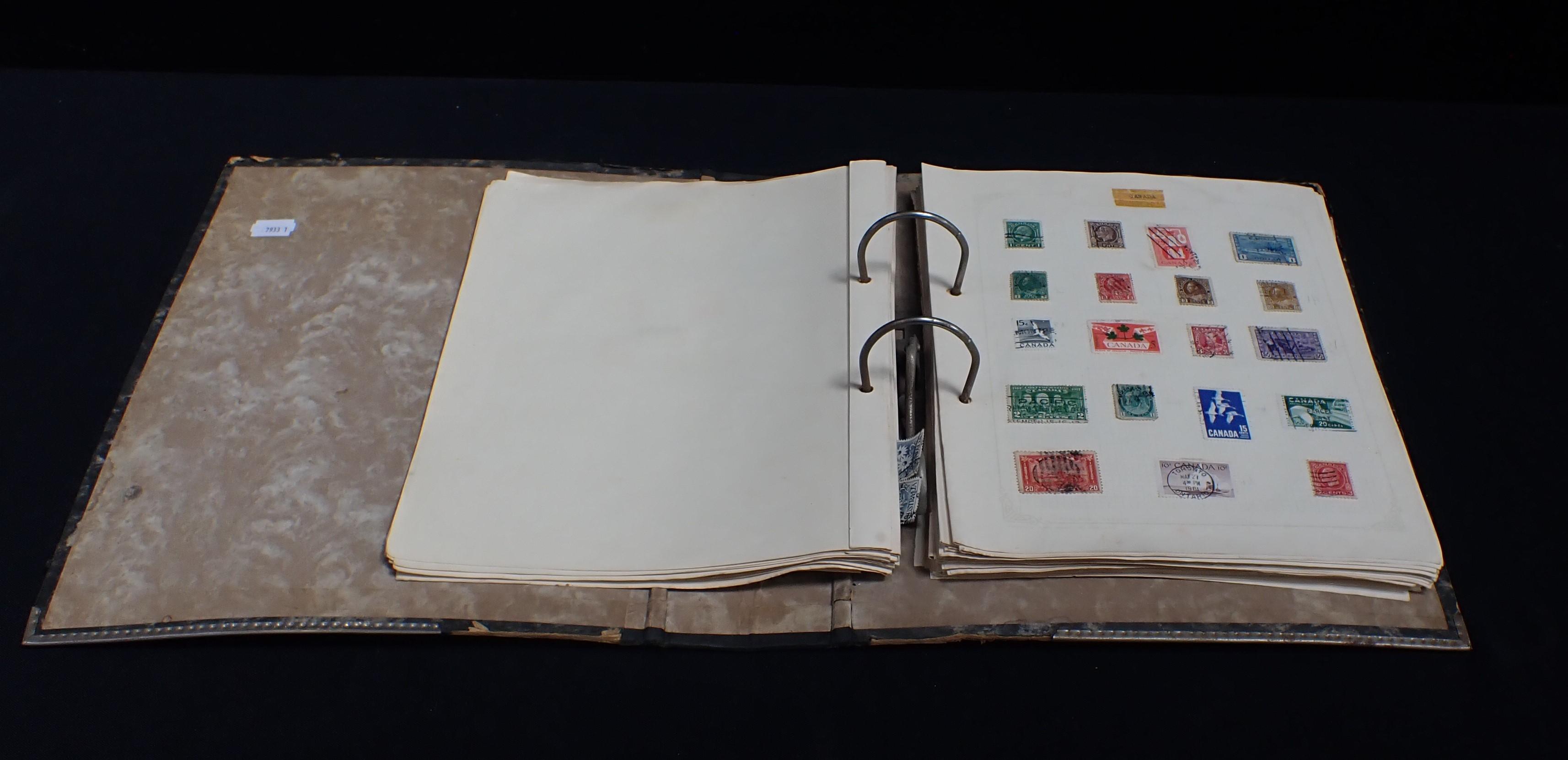 AN LEVER ARCH FOLDER OF MIXED INTERNATIONAL STAMPS