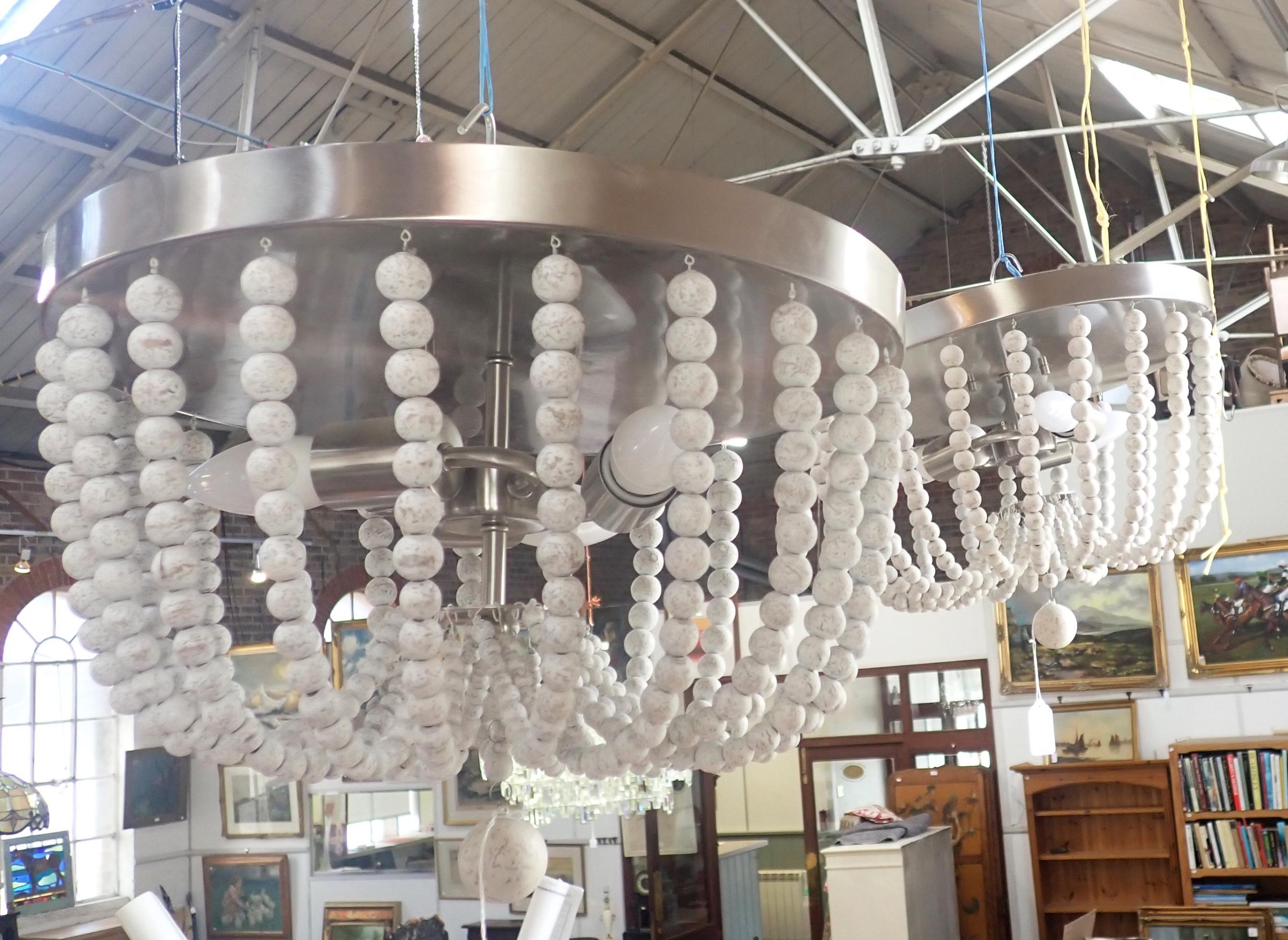 A PAIR OF CONTEMPORARY BEADED CEILING LIGHTS BY KENROY HOME