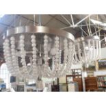 A PAIR OF CONTEMPORARY BEADED CEILING LIGHTS BY KENROY HOME
