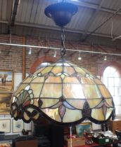 A LEADED GLASS HANGING LAMPSHADE