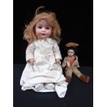 A BISQUE HEADED DOLL: 'HEUBACH. KOPPELSDORF. 300. 7'