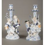 A PAIR OF DRESDEN PORCELAIN FIGURAL CANDLESTICKS