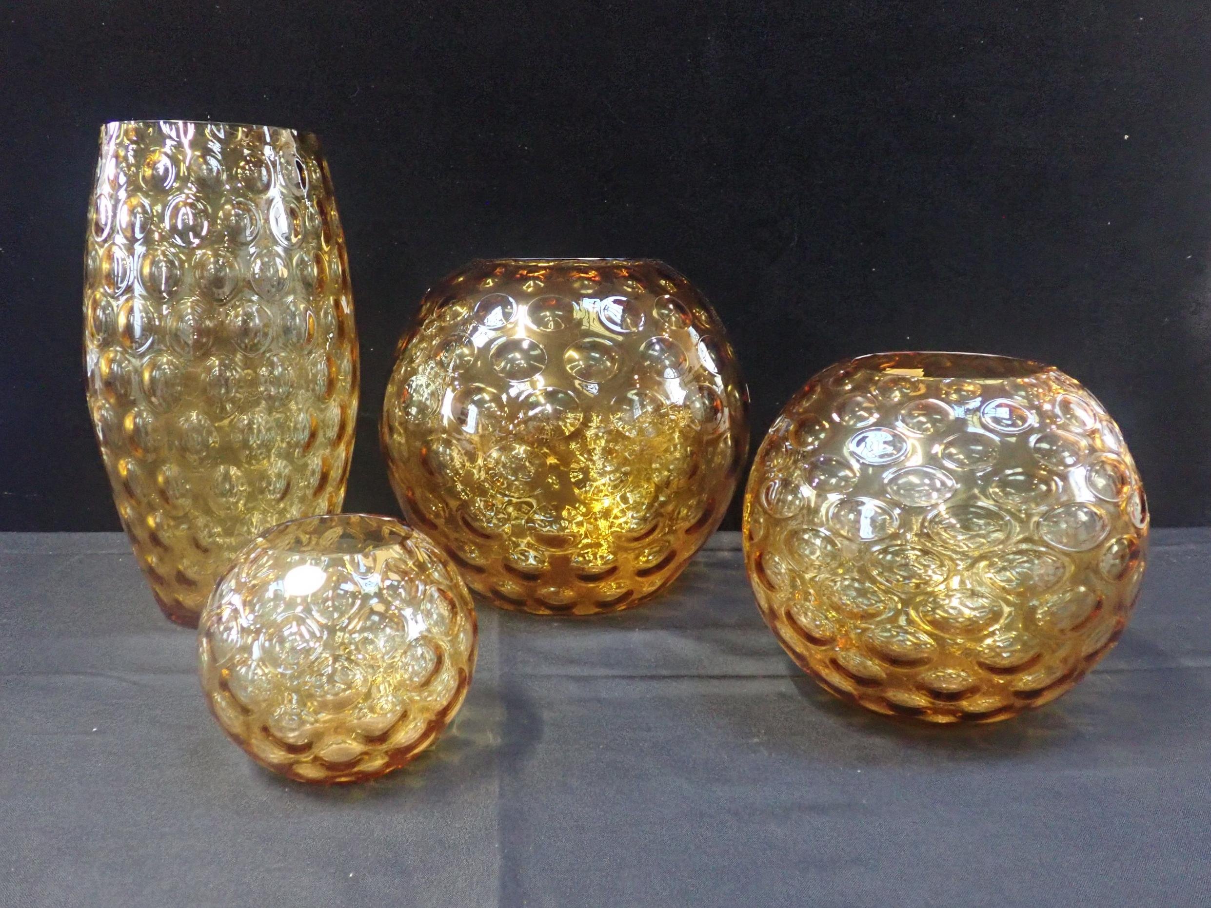 BOHEMIA GLASS: THREE AMBER GRADUATED SPHERICAL VASES