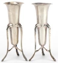 Ridley Brothers & Merton, pair of Arts & Crafts silver three footed bud vases, Birmingham 1904,