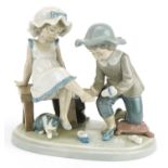 Lladro figure group Try This One, numbered 5361, 15.5cm wide : For further information on this lot