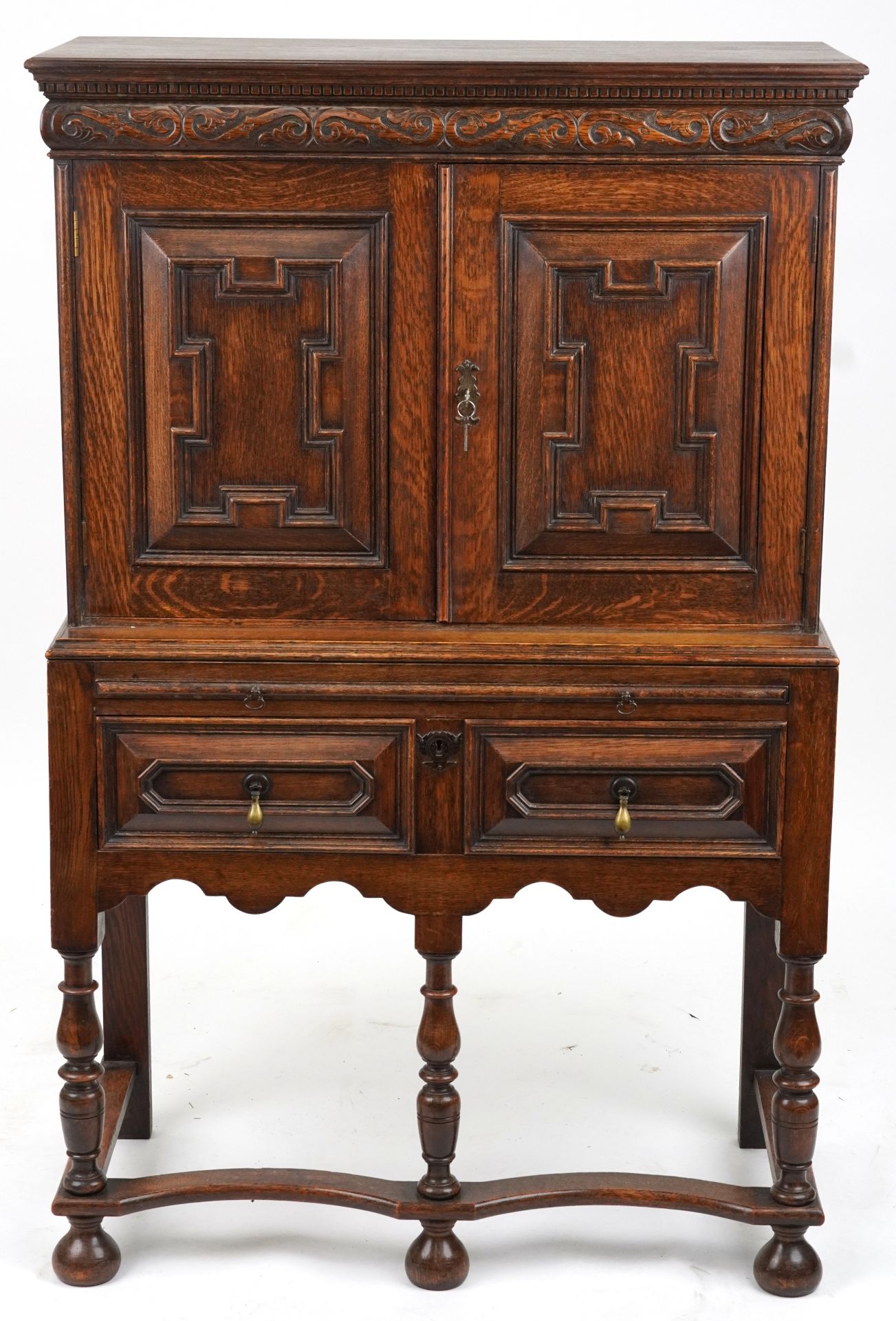 Jacobean Revival oak court cupboard fitted with an assortment of cupboard doors and pigeon holes - Image 2 of 5