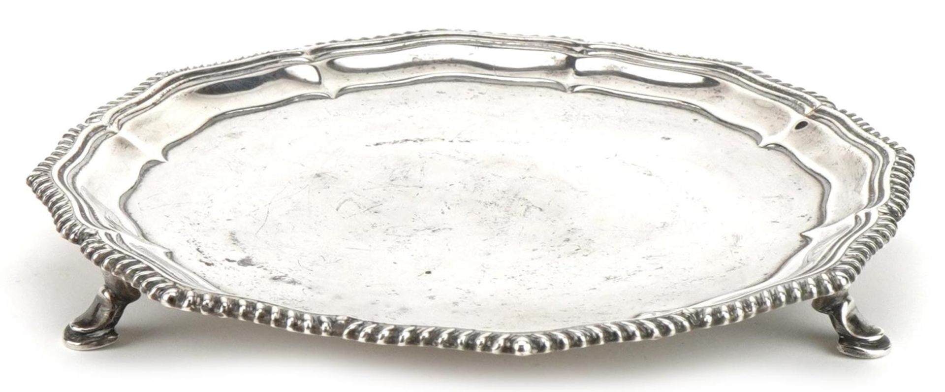 Hawksworth, Eyre & Co Ltd, Victorian circular silver three footed card tray, Sheffield 1896, 15cm in