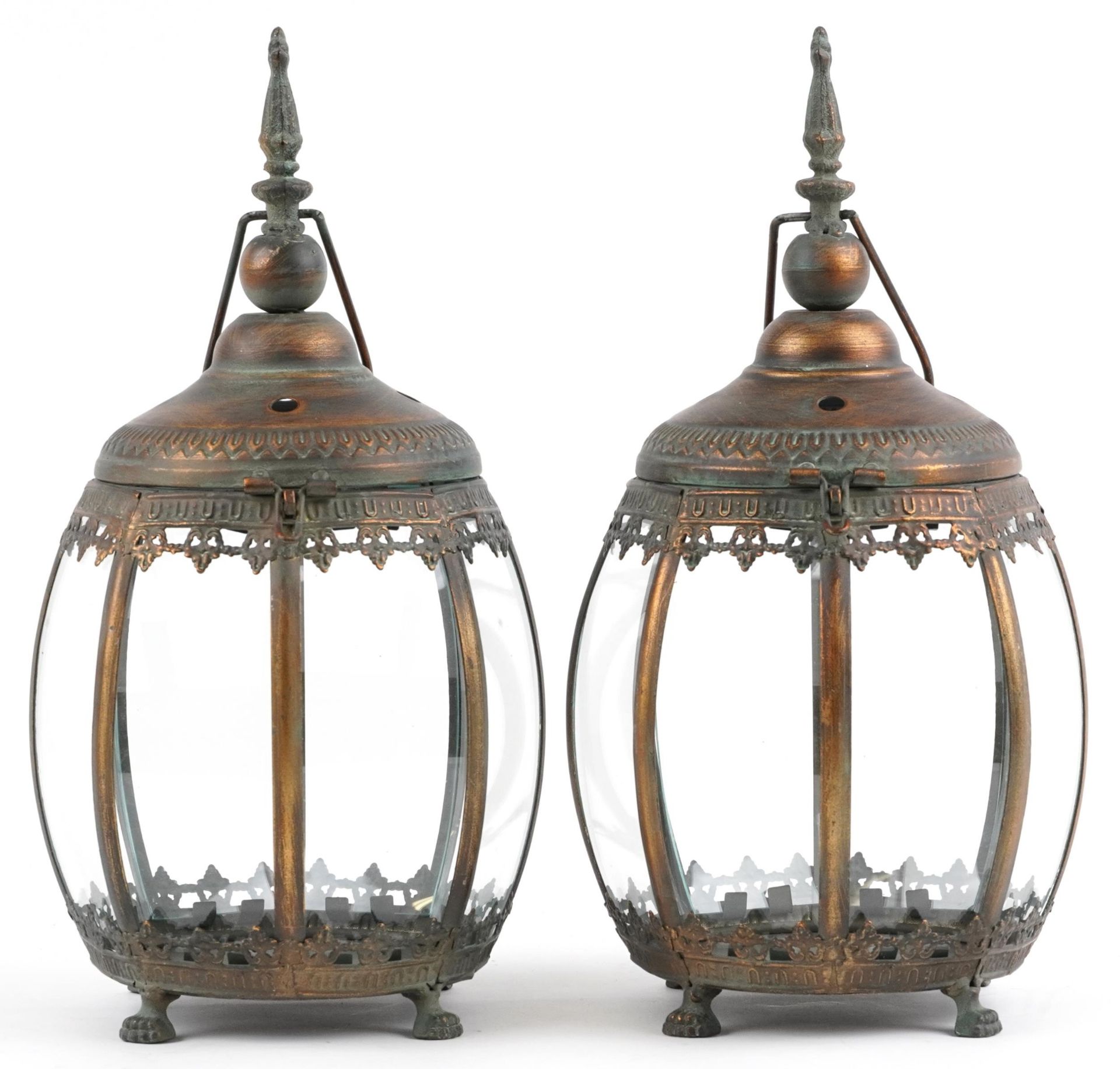 Pair of bronzed hanging lanterns with glass panels on paw feet, each 39.5cm high : For further