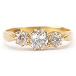 18ct gold diamond three stone ring, total diamond weight approximately 0.80 carat, size P, 2.9g :