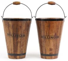 Pair of Bollinger design hardwood Champagne buckets with metal mounts and swing handles, each 40cm