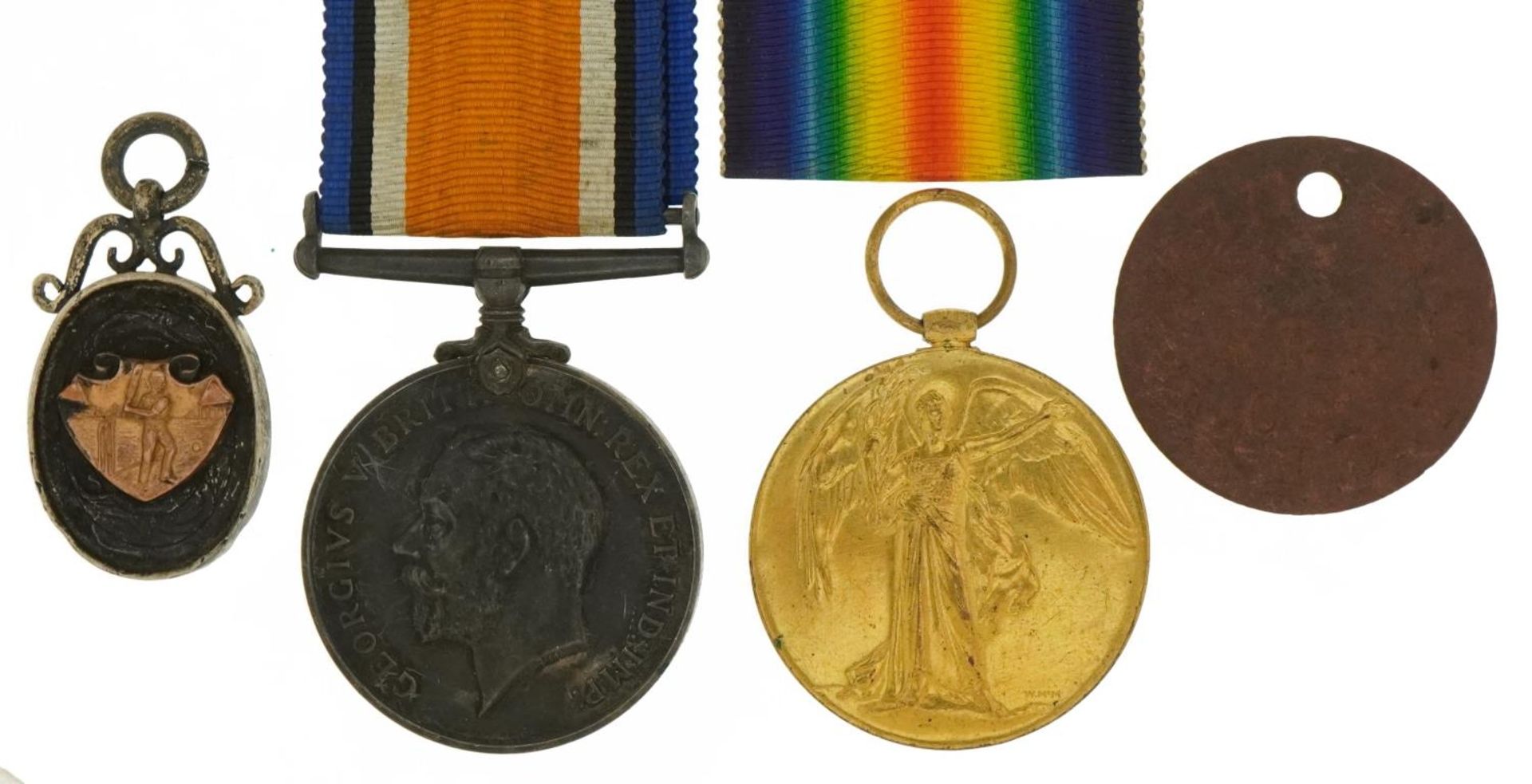 British military World War I pair with related dog tag and silver sports jewel, the pair awarded