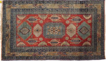 Rectangular Persian rug having an all over floral design, 158cm x 95cm : For further information