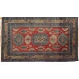 Rectangular Persian rug having an all over floral design, 158cm x 95cm : For further information