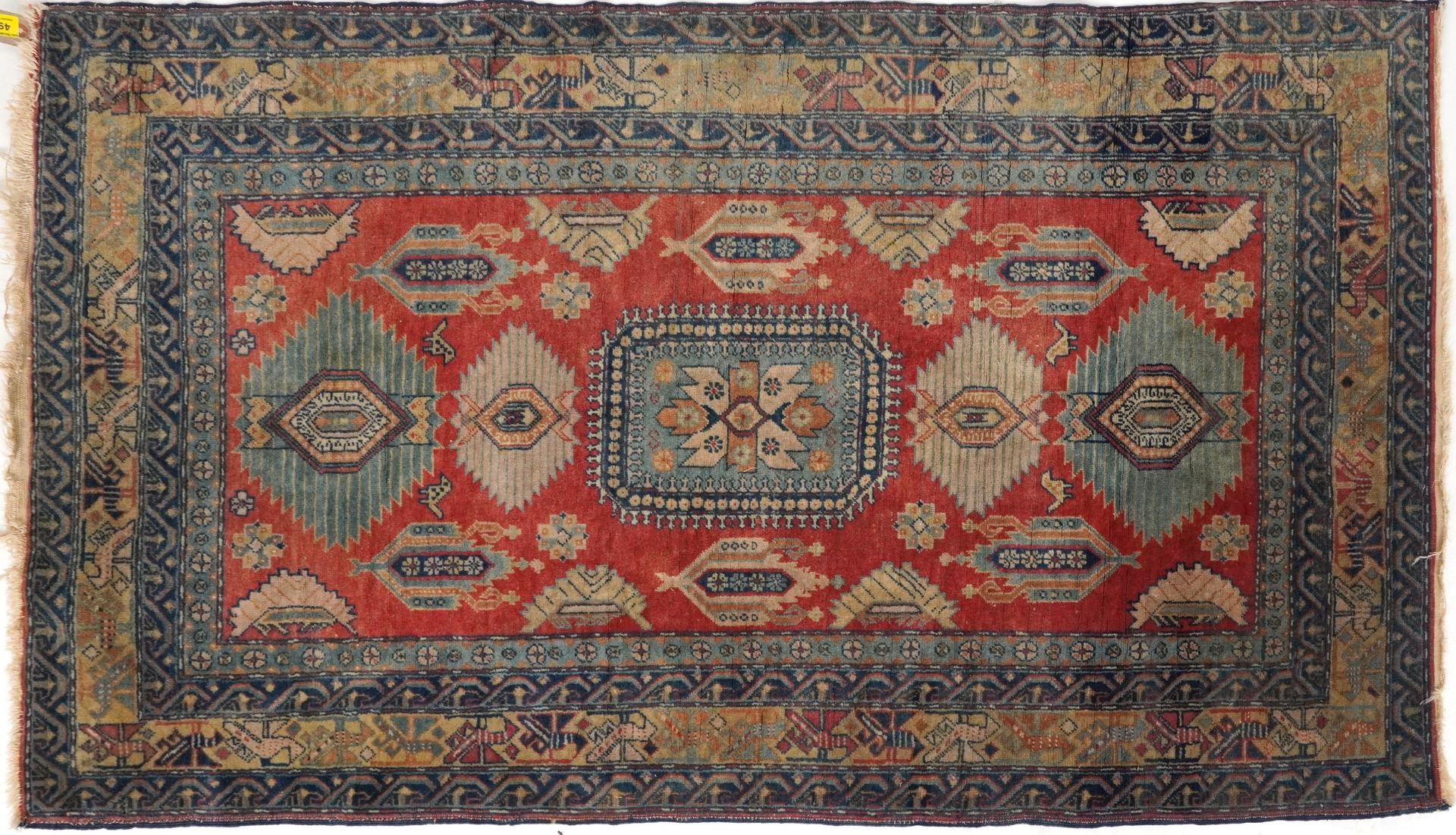 Rectangular Persian rug having an all over floral design, 158cm x 95cm : For further information
