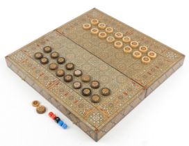 Syrian Moorish style Vizagapatam folding games board with backgammon set, 11cm high x 52cm W x