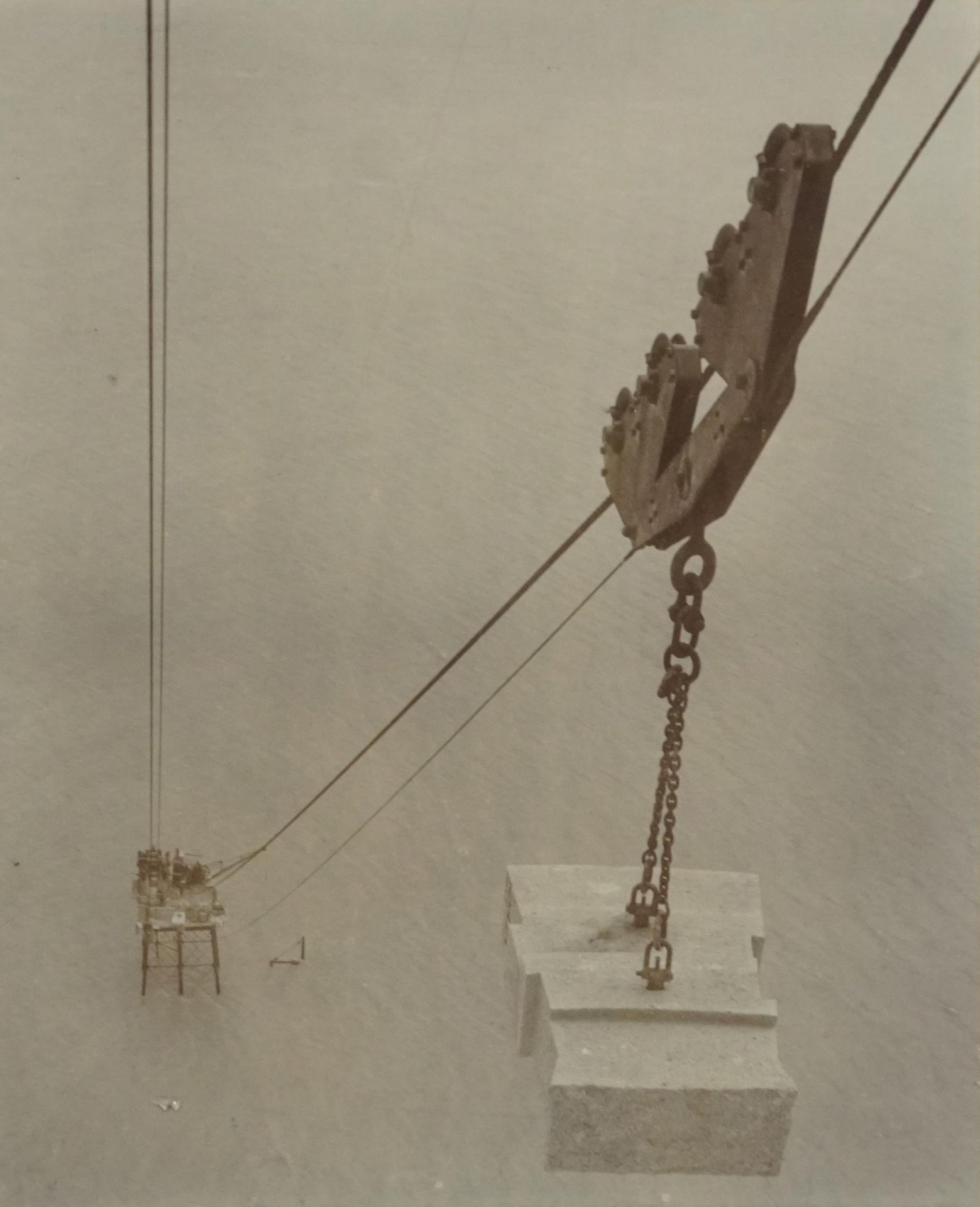 Early 20th century local interest Albumen photograph of Cornish granite being lowered from Beachy