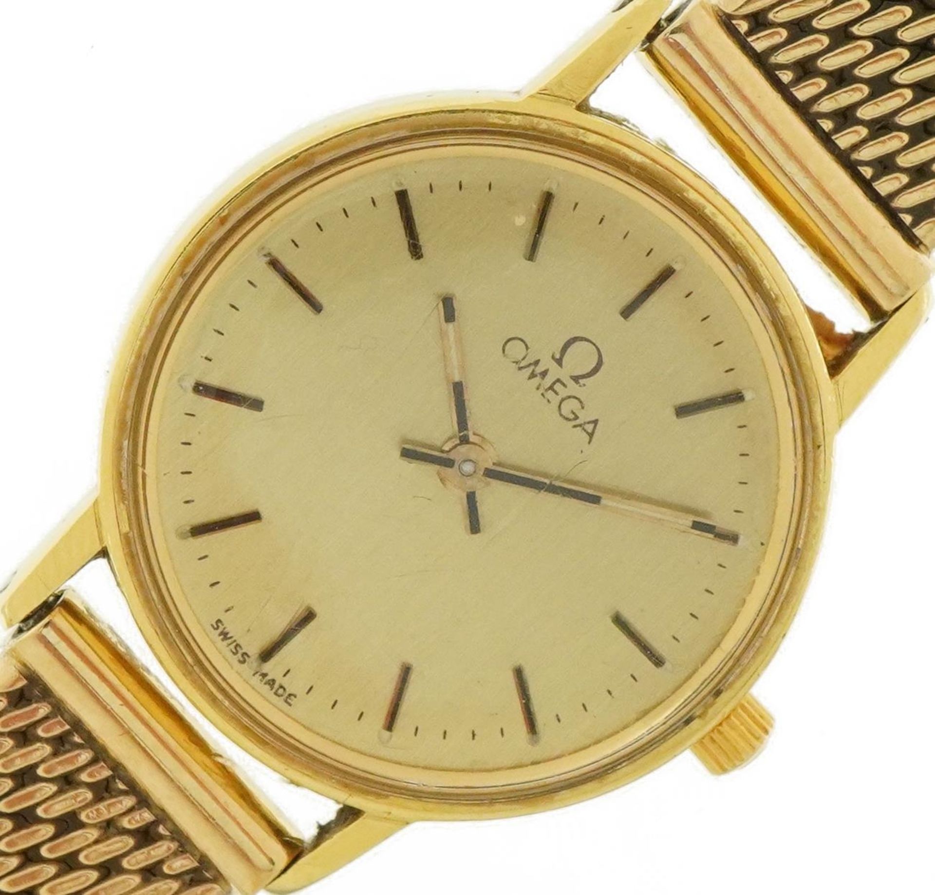 Omega, ladies 18ct gold wristwatch with 9ct gold strap with paperwork and Garrard & Co box, 21mm