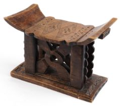 African tribal interest hardwood seat in the form of a headrest, 31cm H x 43.5cm W x 19cm D : For