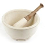 Large stone pestle and mortar, impressed marks to the mortar, the mortar 28.5cm in diameter : For