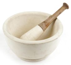 Large stone pestle and mortar, impressed marks to the mortar, the mortar 28.5cm in diameter : For