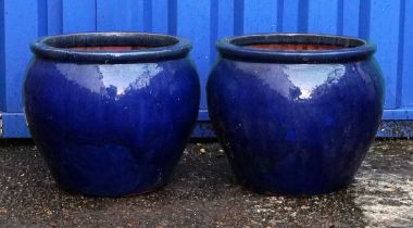 Pair of garden stoneware blue glazed planters, each 33cm high x 36cm in diameter : For further