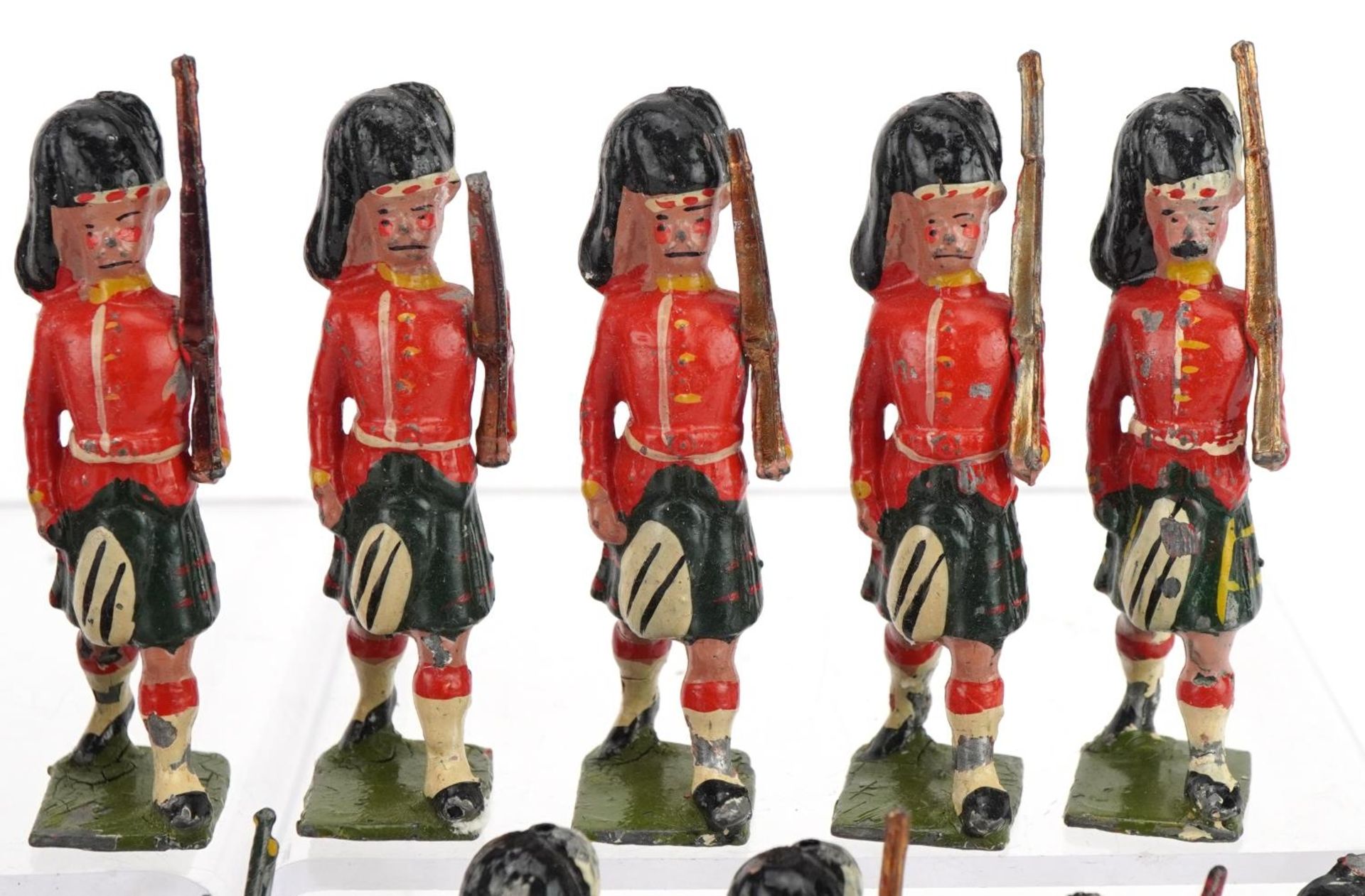 Nineteen Britains hand painted lead Gordon Highlanders soldiers and piper, some with articulated - Image 4 of 8