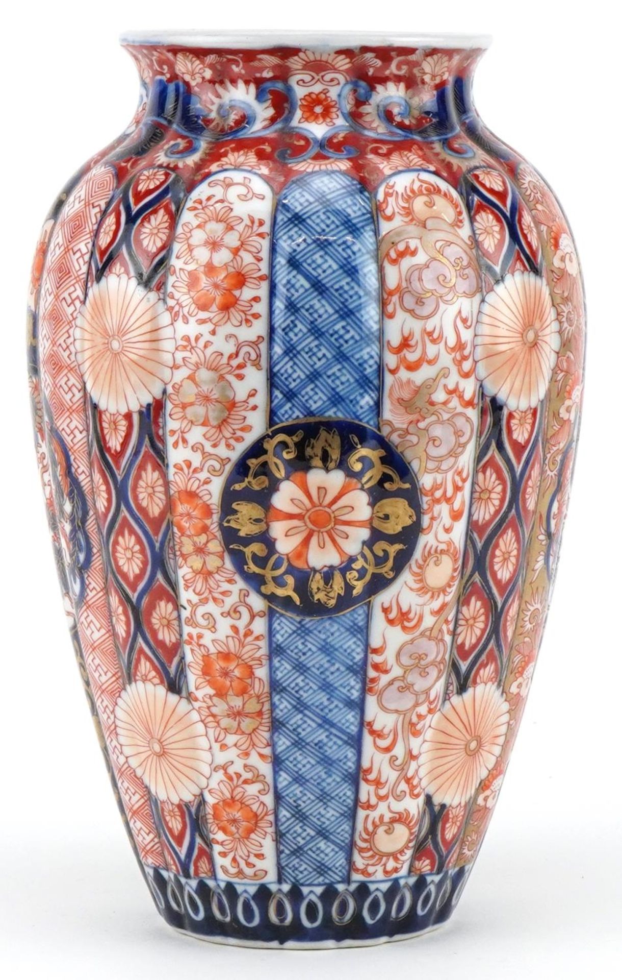 Japanese Imari porcelain fluted vase hand painted with flowers and stylised roundels enclosing - Image 4 of 7