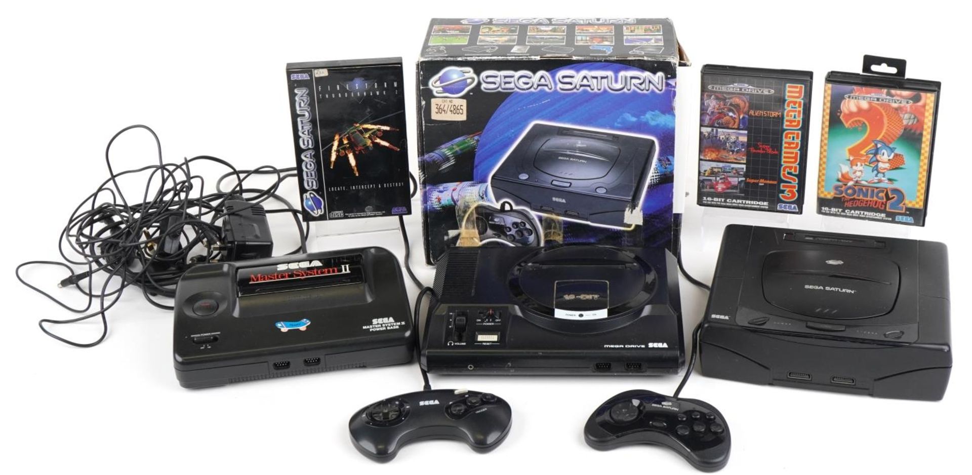 Vintage Sega games consoles and games including Sega Saturn with box, Sega Master System II and Sega