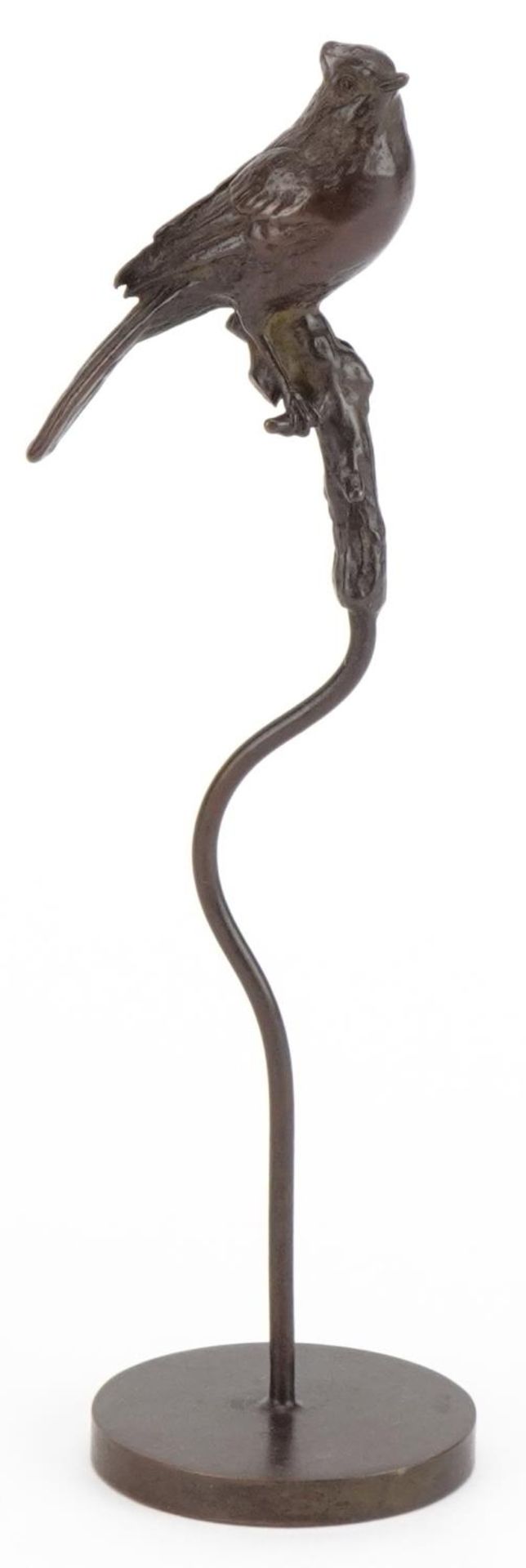 Patinated bronze sculpture of a bird perched on a branch, 17cm high : For further information on