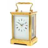 Large Matthew Norman gilt brass repeating carriage clock having enamelled dial with Roman