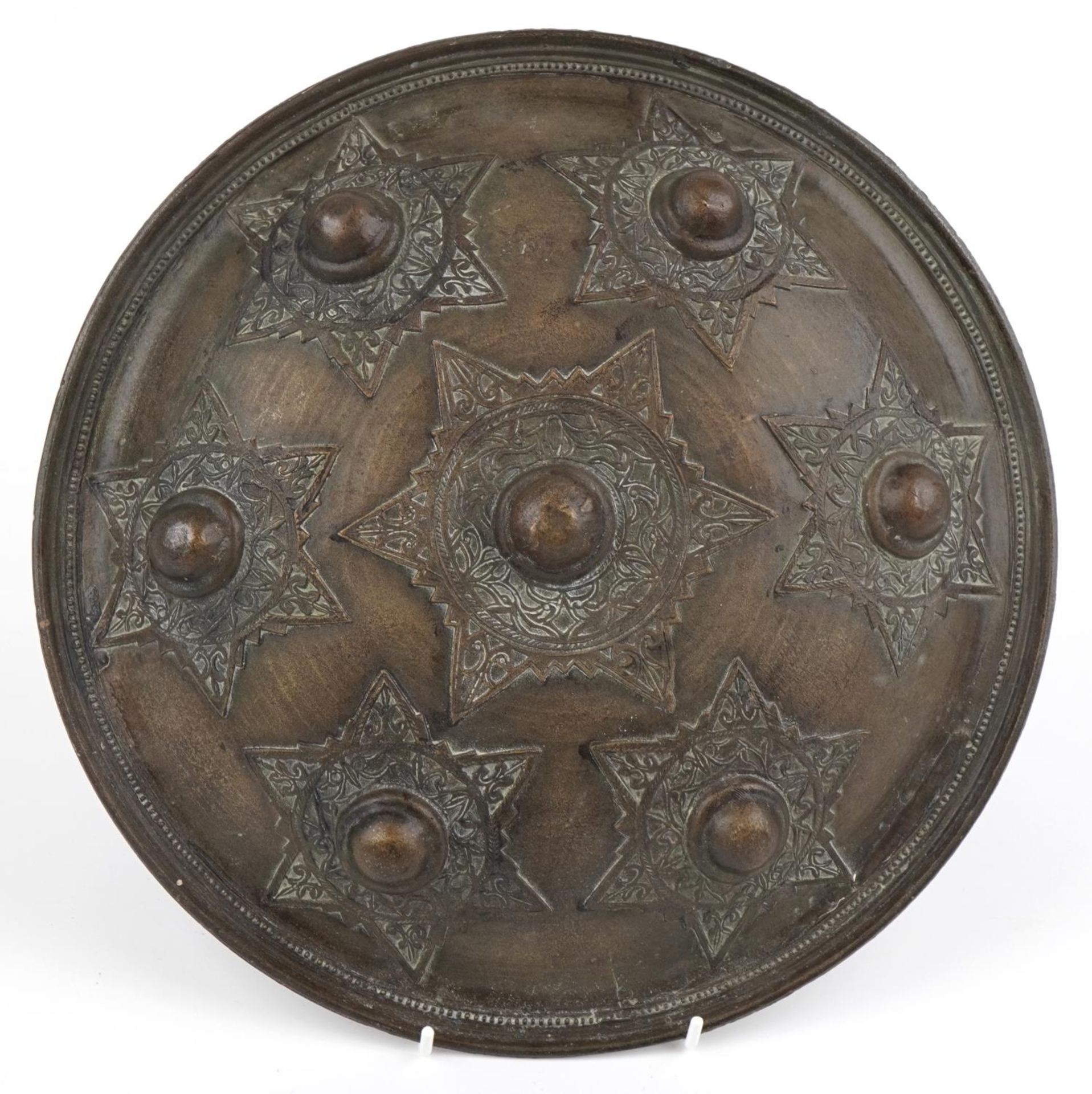 Indo-Persian bronze Dhal shield with star motifs, 31.5cm in diameter : For further information on