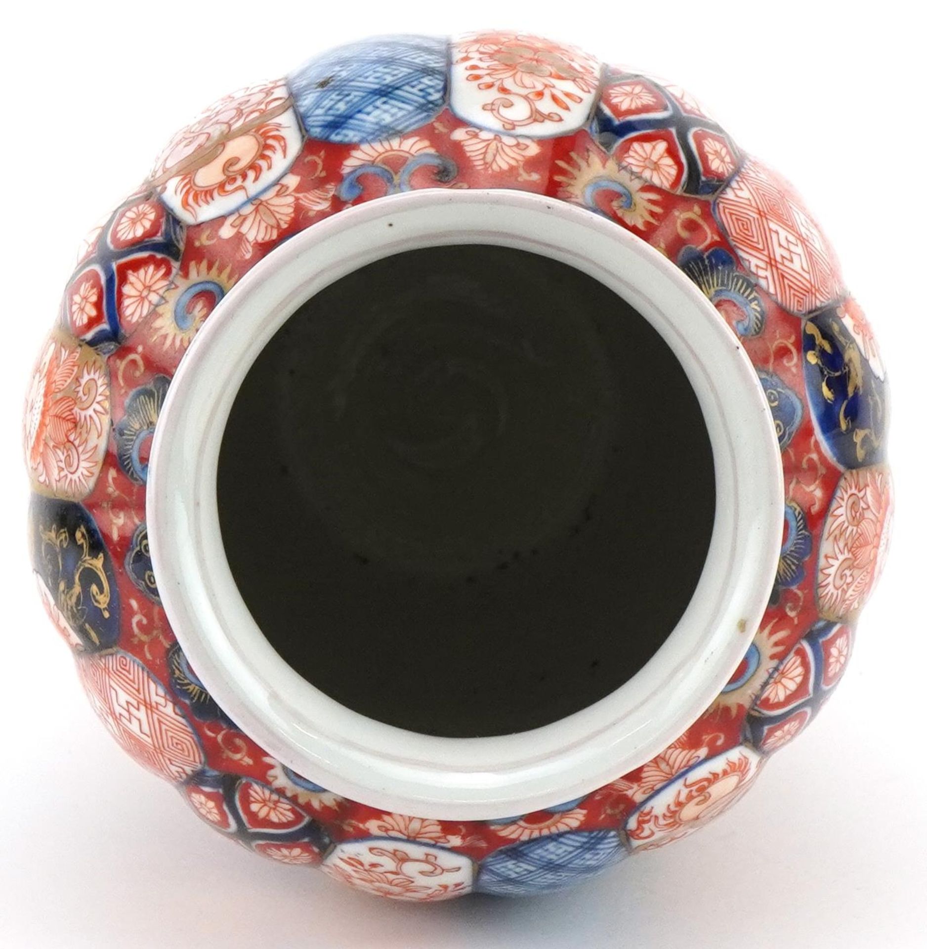 Japanese Imari porcelain fluted vase hand painted with flowers and stylised roundels enclosing - Image 5 of 7