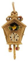 9ct gold and enamel cuckoo clock charm, 2.1cm high, 2.5g : For further information on this lot