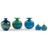 Mdina, Maltese glassware comprising three vases with handles and two dump paperweights, the
